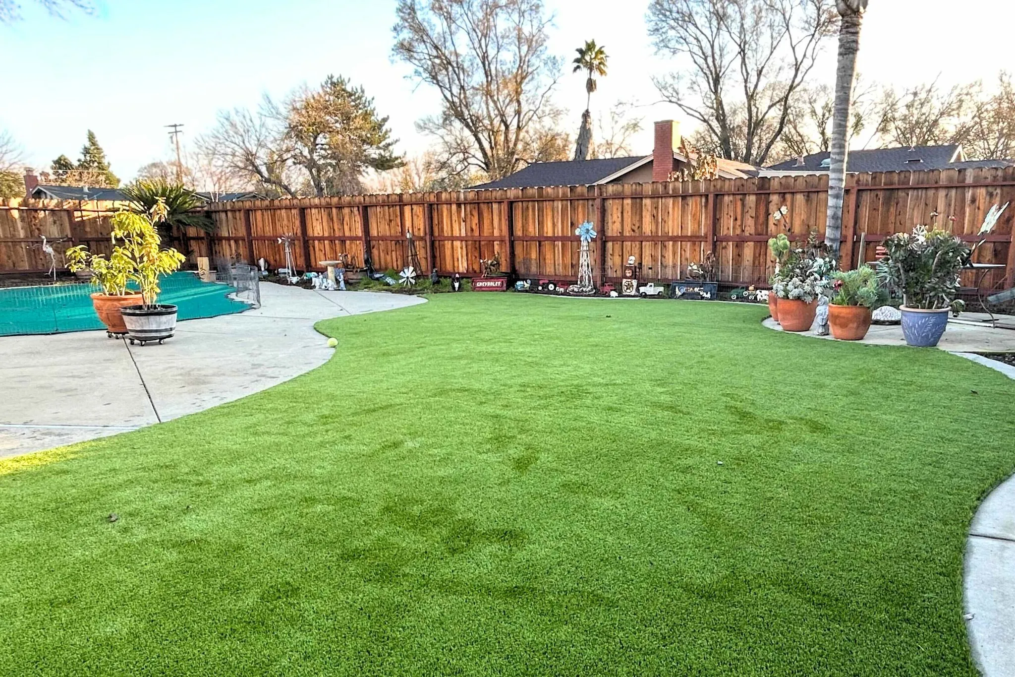 Lush green artificial grass lawn in San Jose backyard